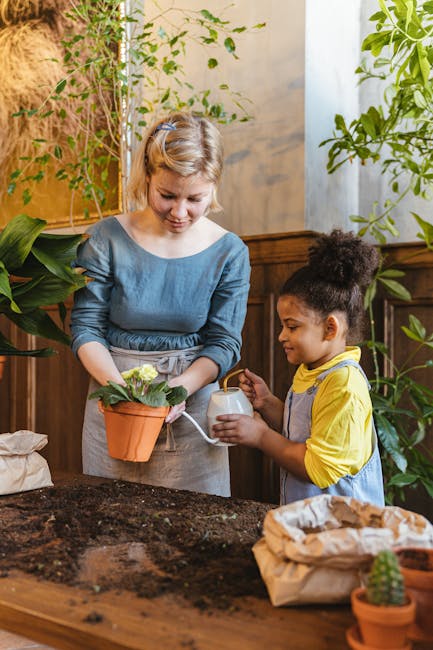 A woman and child bond over gardening with plants and soil indoors.